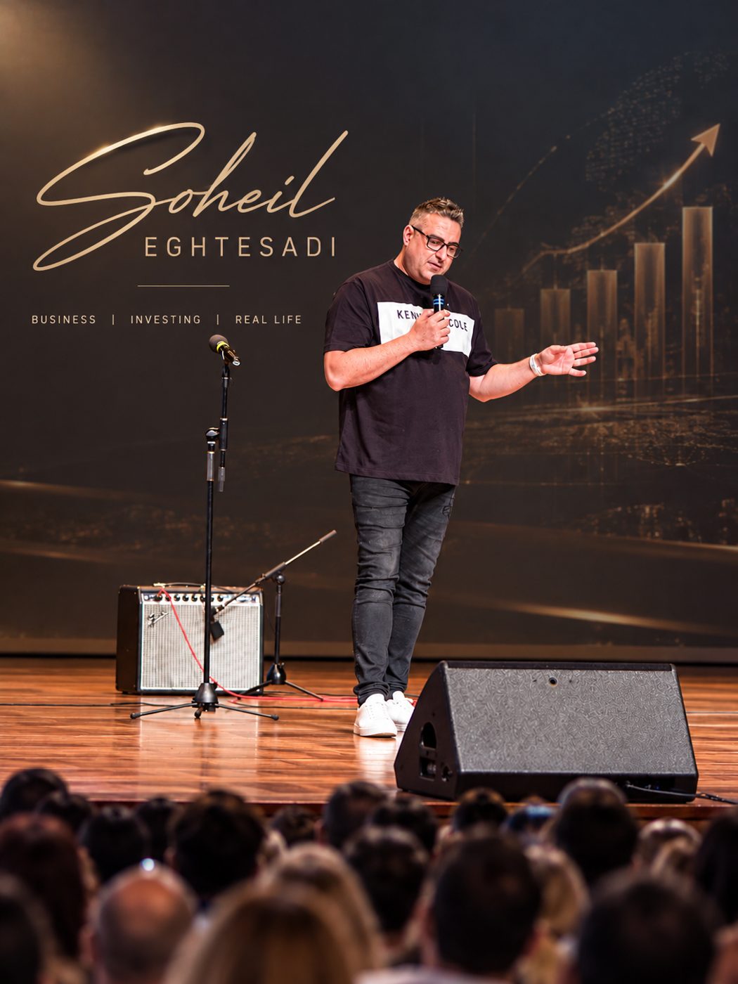 Soheil speaking on stage